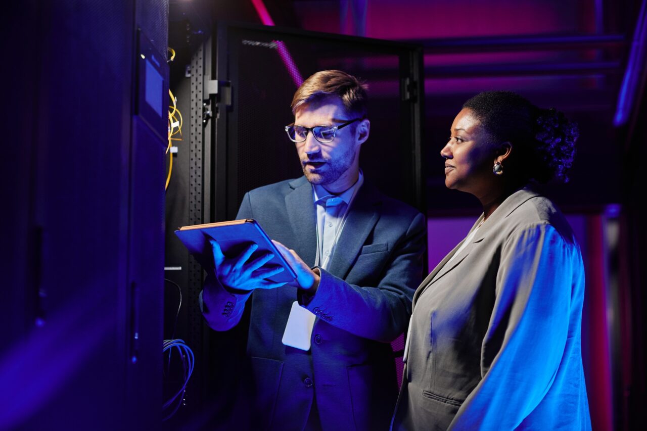 Two Technicians in Server Room